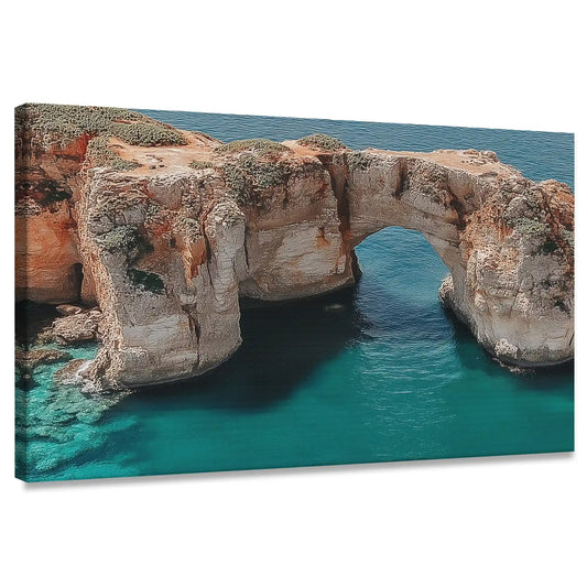Modern coastal cliff canvas wall art for living room featuring turquoise waters and rocky arch