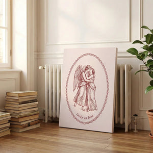 Canvas artwork in vintage style showing a central embrace between two classical figures, enclosed in an ornate oval frame.