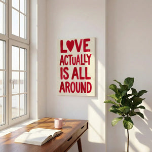 Expressive canvas wall art with centered red text and heart symbol, styled in a playful hand-painted design on white background.