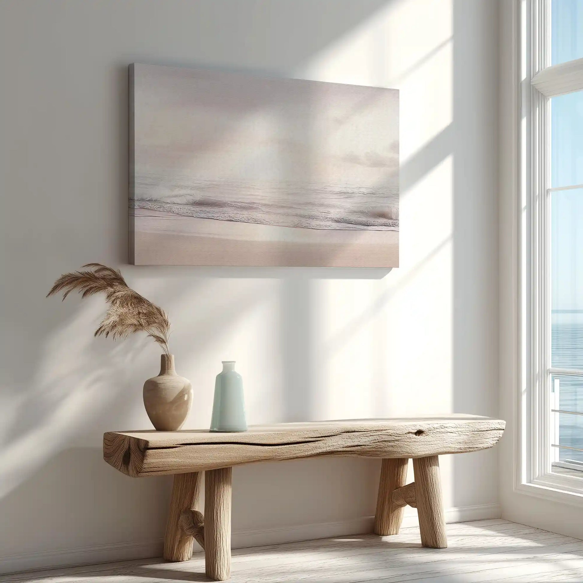 Soft muted shoreline canvas art enhancing serene and light-filled bedroom design
