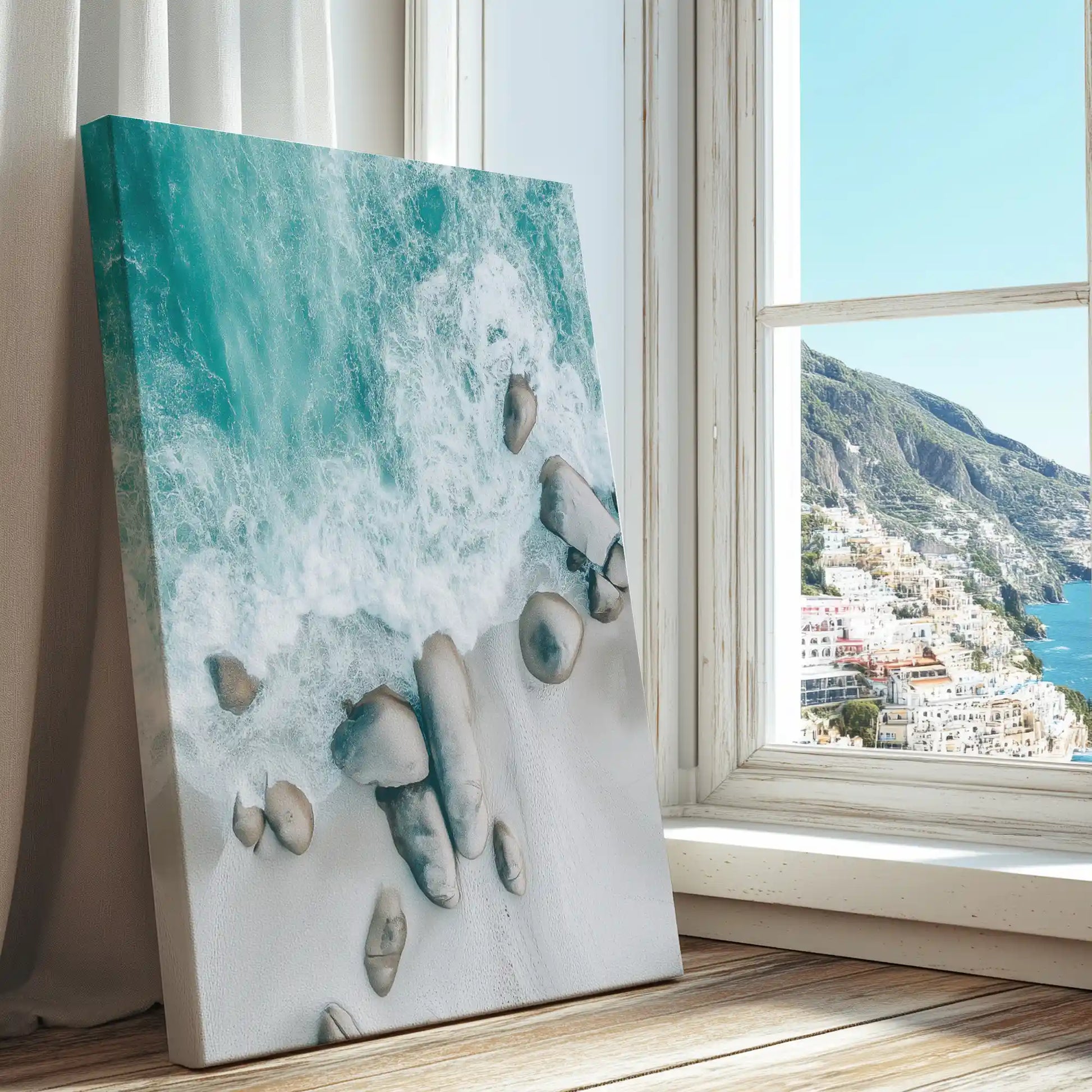 Waves crashing on sandy beach with rocks captured in a coastal canvas print with minimalist style