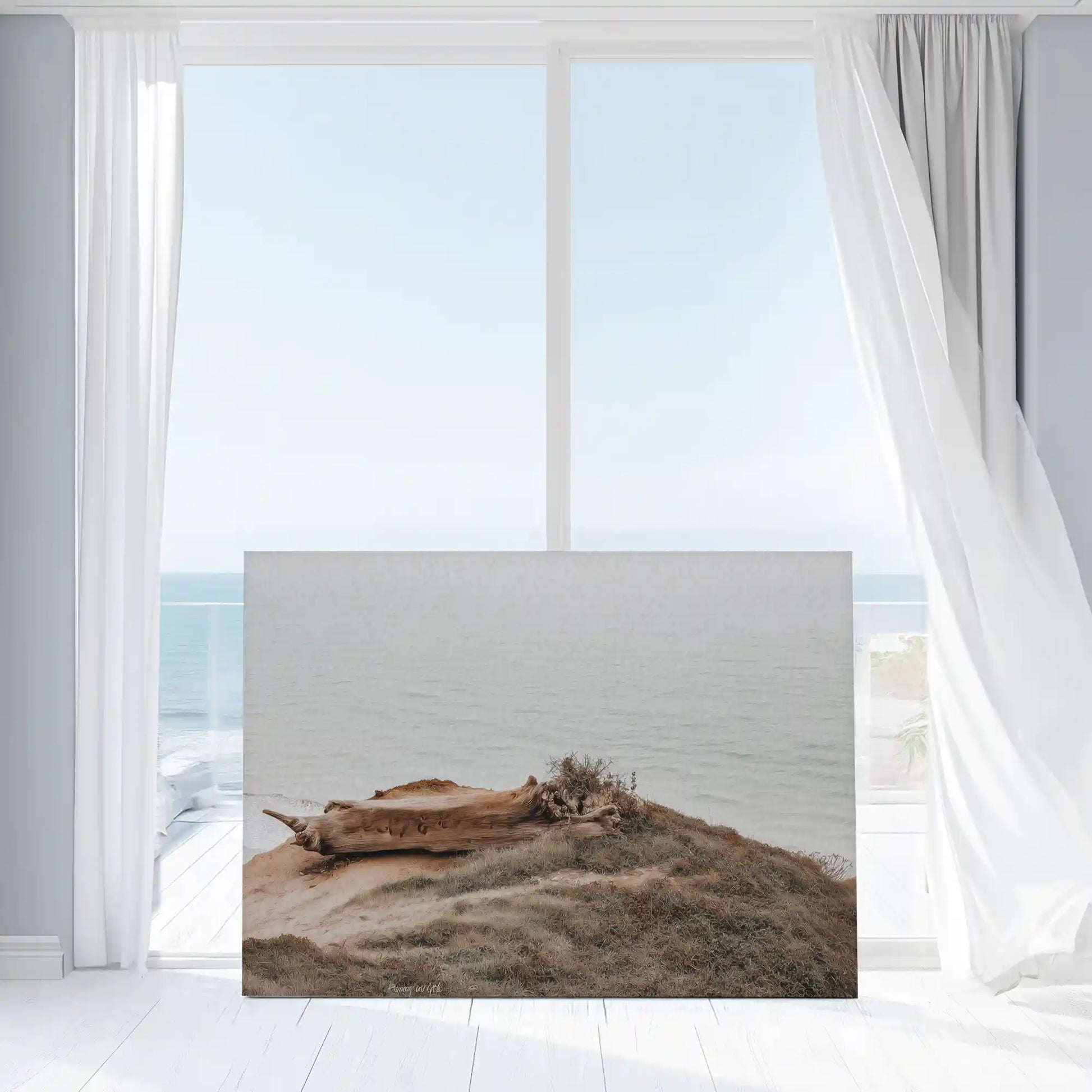 Muted beige ocean view wall art bringing a calm and natural mood into minimalist interiors