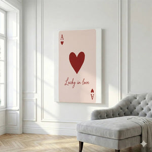 Romantic canvas wall decor with a flat graphic heart and letter A, balanced by soft tones and centered composition.