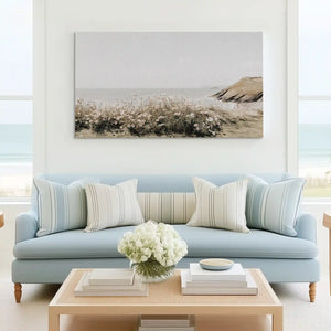 Tranquil shoreline wildflower canvas wall art complementing Scandinavian décor