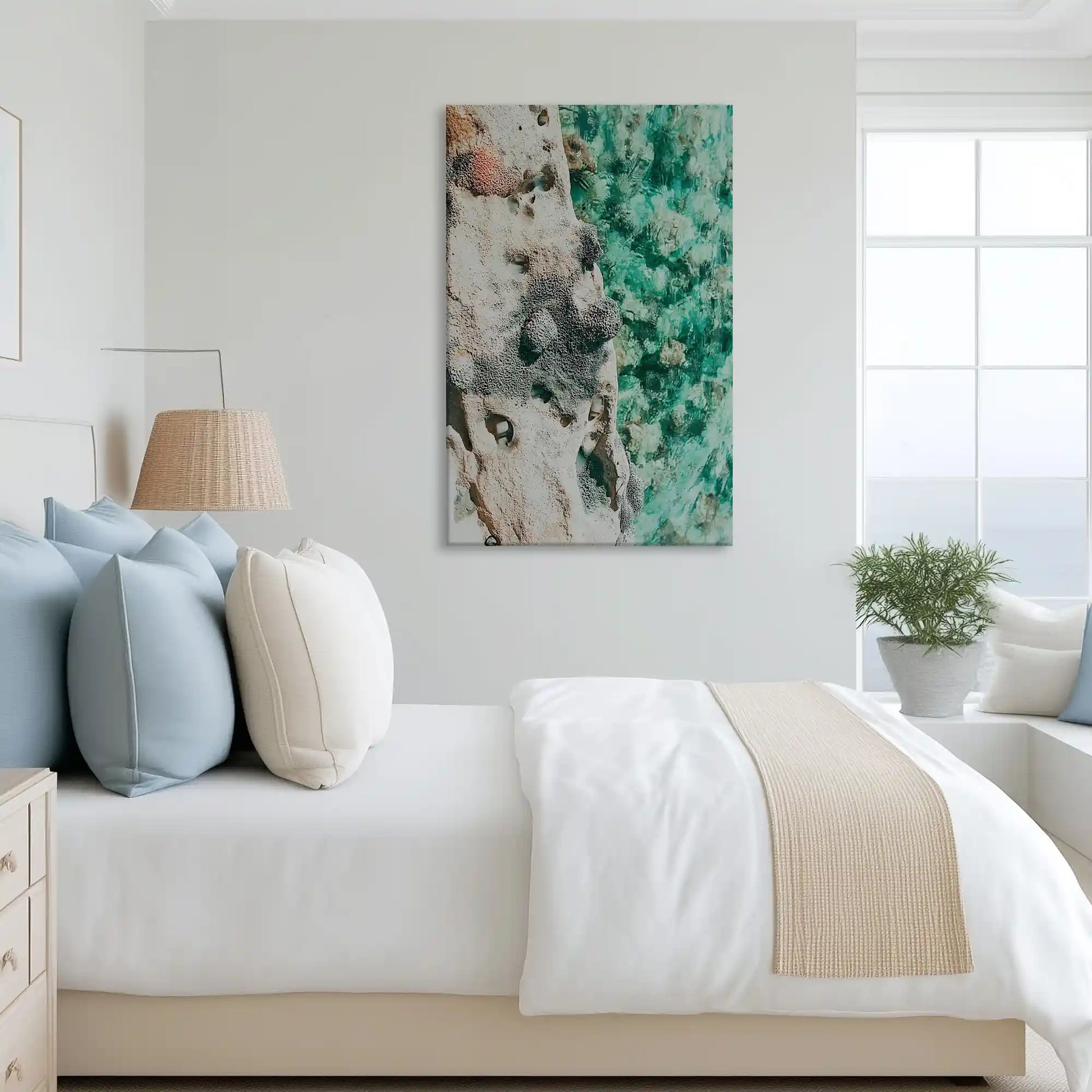 Dynamic turquoise sea canvas art complementing minimalist decor with bold coastal textures