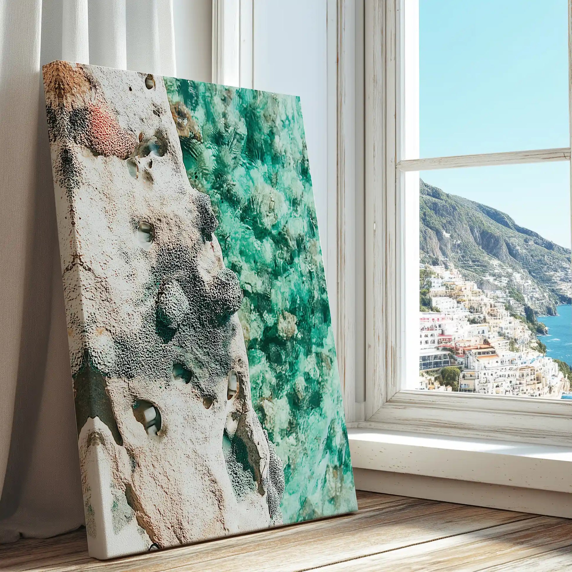 Rocky shoreline with emerald water captured in a contemporary canvas print with abstract style