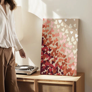 Gallery wrapped canvas showing a playful arrangement of hearts with sharp lines and a soft color gradient