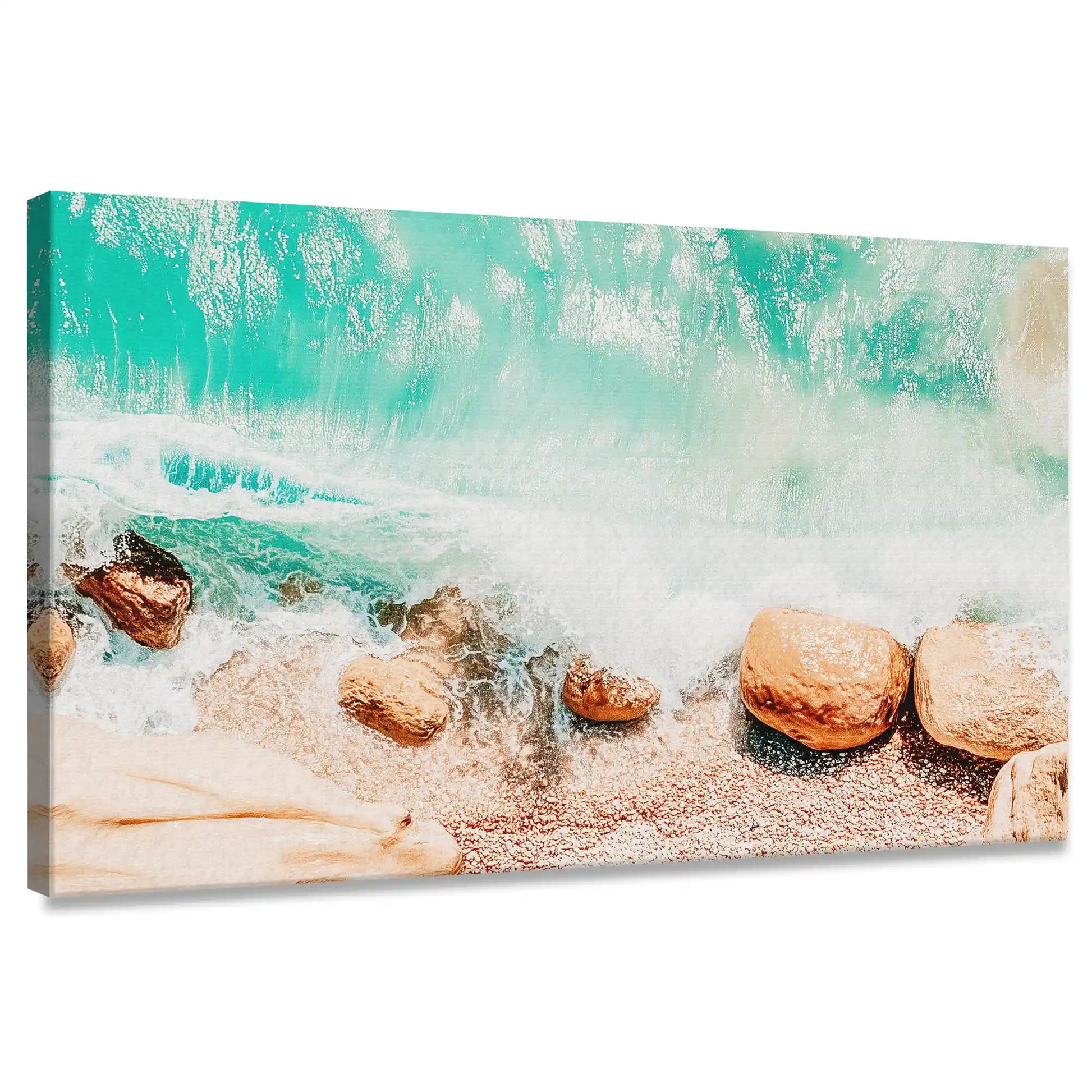 Coastal canvas wall art with turquoise ocean waves washing over sandy rocks