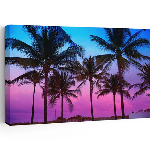 Abstract sunset art featuring silhouetted palm trees against a colorful twilight sky.