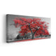 Minimalist black and white tree painting with red highlight