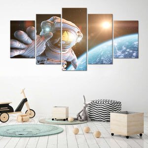 Astronaut In Outer Space Canvas Wall Art