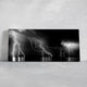 Large nautical wall decor featuring a breathtaking lightning display at night.