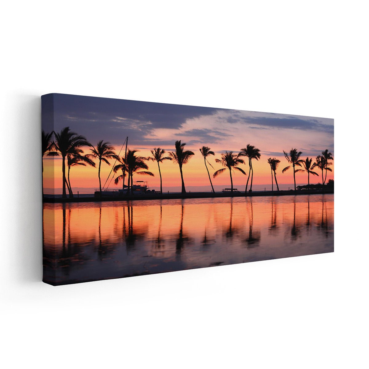 Framed tropical wall art showcasing an island sunset with warm hues.