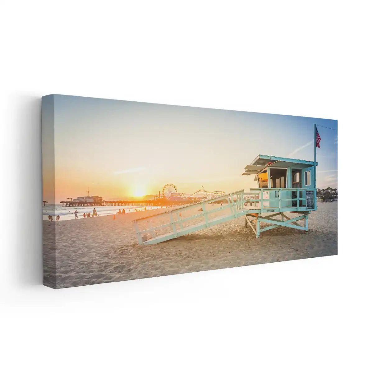 Sunset canvas wall art featuring a lifeguard station on a sandy beach.