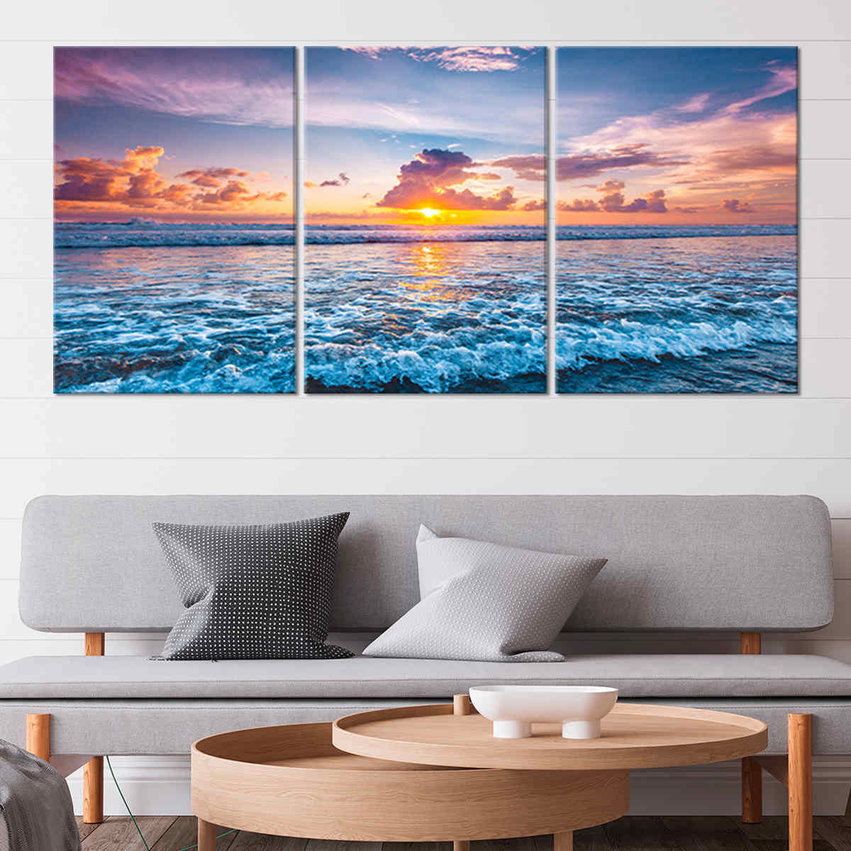 Coastal wall art featuring a vibrant sunset and ocean waves, bringing tranquility to your home.