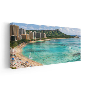 Large beach canvas wall art with high-rise hotels, golden sand, and a vibrant ocean scene.