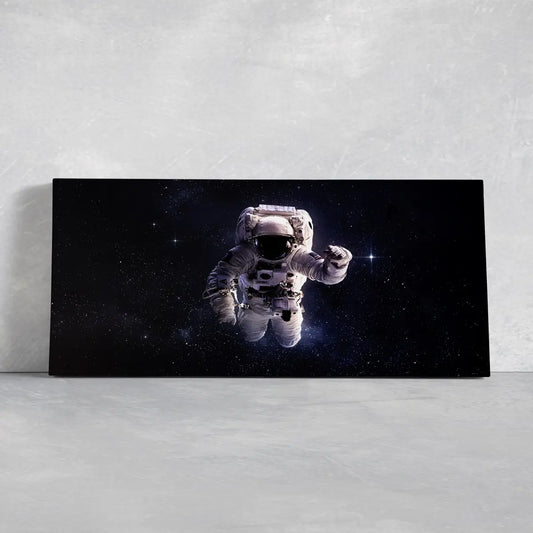 Astronaut floating in deep space canvas wall art for living room decor, dark cosmic backdrop creates an inspiring and futuristic mood