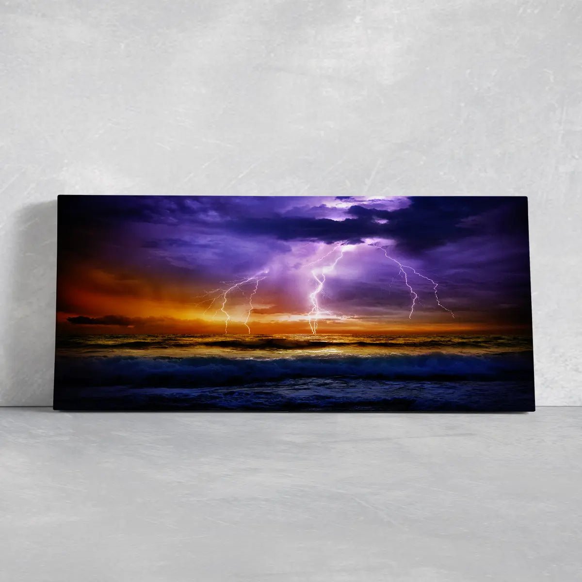 Beach wall art for living room featuring a stormy sunset with glowing lightning over the ocean, perfect for coastal aesthetics.