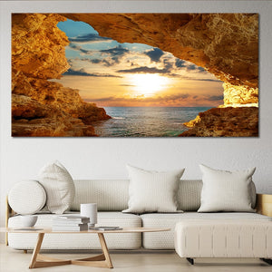 Framed coastal artwork of a peaceful sunset over the water.