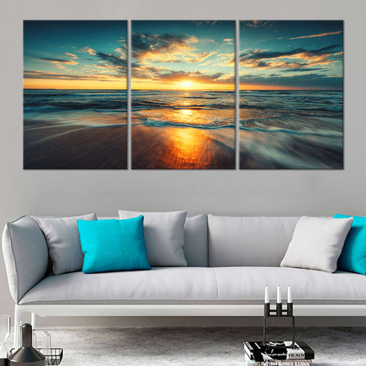 Large coastal wall art featuring a vibrant ocean sunrise.
