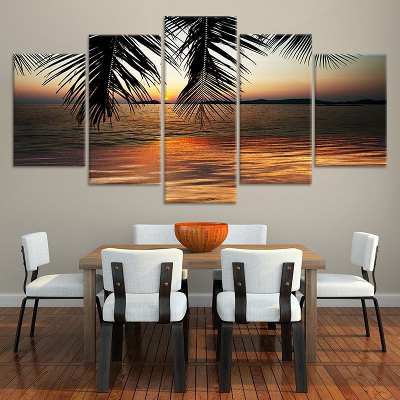 Abstract sunset wall art with palm trees and golden sky.