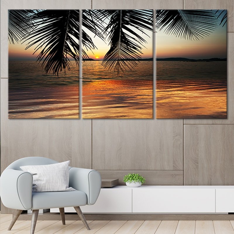Beach sunset wall art with warm hues and ocean waves.
