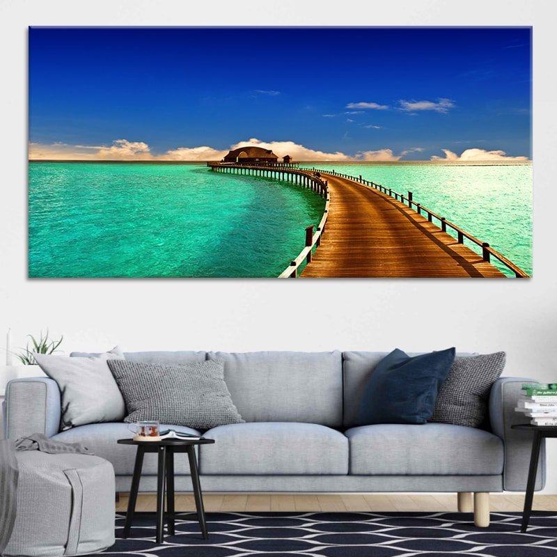 Large canvas beach wall art depicting a peaceful Maldives overwater resort with crystal-clear waters.
