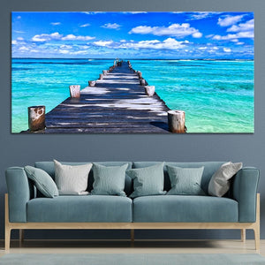 Coastal framed artwork showcasing a stunning turquoise ocean scene.