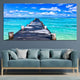 Coastal framed artwork showcasing a stunning turquoise ocean scene.