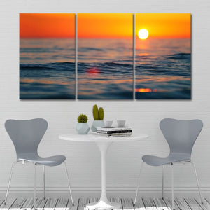 Nautical wall decor with a breathtaking seascape and evening sky.