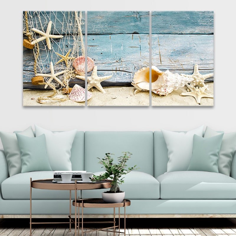 Nautical wall art featuring seashells, starfish, and a weathered wood texture.
