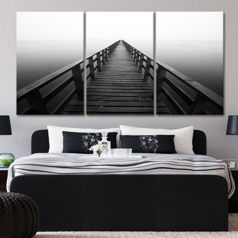 Framed ocean artwork with a monochrome pier, creating a calm ocean wall art canvas display.