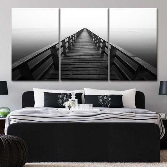 Framed ocean artwork with a monochrome pier, creating a calm ocean wall art canvas display.