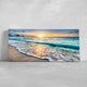 Large beach wall art featuring a vibrant sunrise beach scene, perfect for modern coastal wall decor.