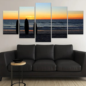 Beach scenes wall art with a stunning ocean view and surfboards.