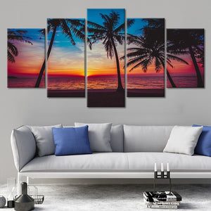 Coastal canvas wall art of a breathtaking sunset and beach scenery.