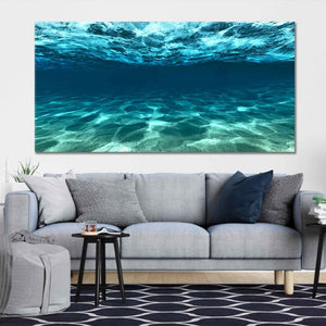 Framed ocean wall art with a serene underwater theme, ideal for ocean-themed bedroom wall decor.
